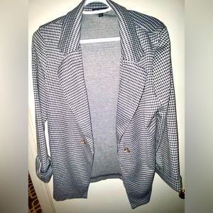 Excellent used condition, black and white blazer.